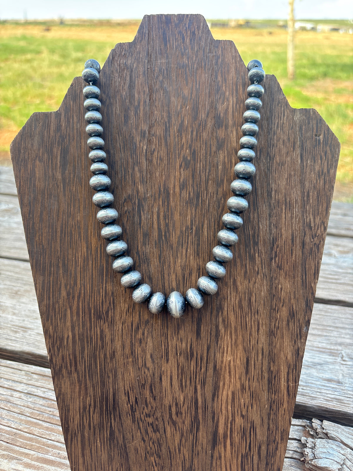 18" graduated, stamped sterling silver Navajo pearls made by Bryannen Halwood cps18t3np